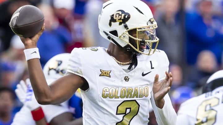 Nov 23, 2024; Kansas City, Missouri, USA; Colorado quarterback Shedeur Sanders (2) passes the ball during the 2nd quarter between the Kansas Jayhawks and the Colorado Buffaloes at GEHA Field at Arrowhead Stadium. Mandatory Credit: Nick Tre. Smith-Imagn Images Nov 23, 2024; Kansas City, Missouri, USA; Colorado quarterback Shedeur Sanders (2) passes the ball during the 2nd quarter between the Kansas Jayhawks and the Colorado Buffaloes at GEHA Field at Arrowhead Stadium. Mandatory Credit: Nick Tre. Smith-Imagn Images