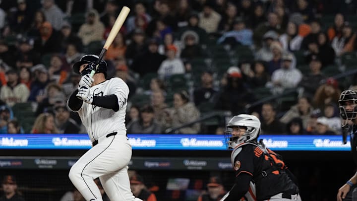Apr 26, 2025; Detroit, Michigan, USA; Detroit Tigers first base Spencer Torkelson (20) hits a double to left field and drives in two runs in the seventh inning during game two of a double header against the Baltimore Orioles at Comerica Park. 