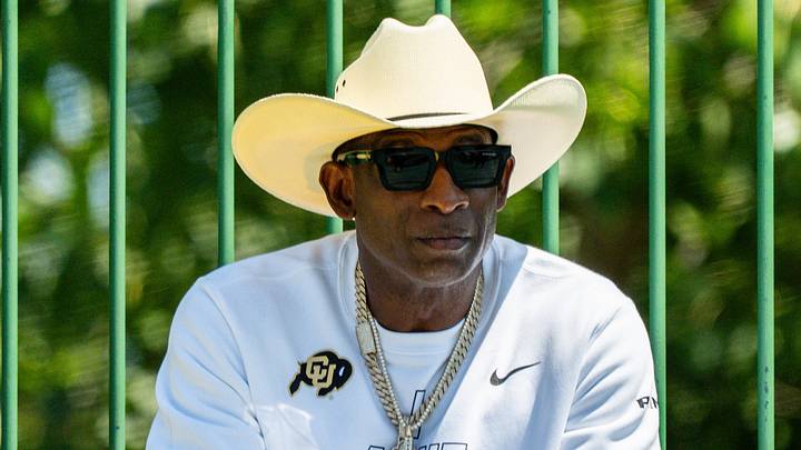 Deion Sanders takes in the second day of Cleveland Browns training camp, July 30, 2026, in Berea, Ohio.