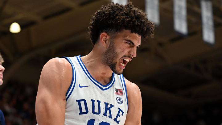 Dec 31, 2025; Durham, North Carolina, USA; Duke Blue Devils forward Cameron Boozer (12) reacts after scoring during the second half against the Georgia Tech Yellow Jackets at Cameron Indoor Stadium.   The Blue Devils won 85-79.  Mandatory Credit: Rob Kinnan-Imagn Images