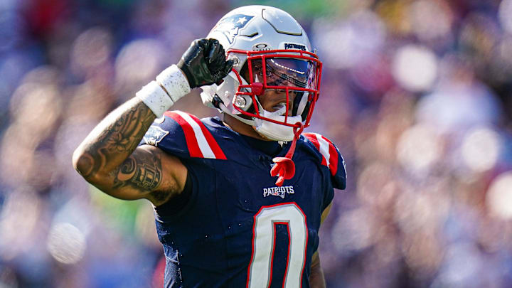 Sep 15, 2024; Foxborough, Massachusetts, USA; New England Patriots cornerback Christian Gonzalez (0) reacts after a play against the Seattle Seahawks in the second half at Gillette Stadium. Mandatory Credit: David Butler II-Imagn Images