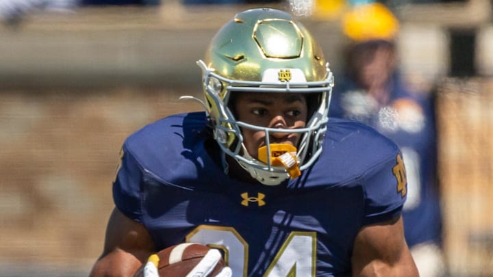 Apr 12, 2025; Notre Dame, IN, USA; Notre Dame Fighting Irish running back Jadarian Price (24) runs the ball during the Blue-Gold game at Notre Dame Stadium. Mandatory Credit: Michael Caterina-Imagn Images