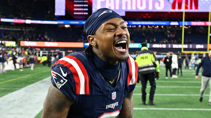 Jan 11, 2026; Foxborough, MA, USA; New England Patriots wide receiver Stefon Diggs (8) reacts after defeating the Los Angeles Chargers in an AFC Wild Card Round game at Gillette Stadium. Mandatory Credit: Eric Canha-Imagn Images
