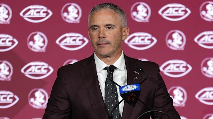 Jul 23, 2025; Charlotte, NC, USA; Florida State head coach Mike Norvell answers questions from the media during ACC Media days at Hilton Charlotte Uptown. Mandatory Credit: Jim Dedmon-Imagn Images