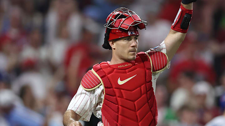 Oct 4, 2025; Philadelphia, Pennsylvania, USA; Philadelphia Phillies catcher J.T. Realmuto (10) reacts after a diving catch by left fielder Harrison Bader (not pictured) in the fifth inning against the Los Angeles Dodgers during game one of the NLDS round for the 2025 MLB playoffs at Citizens Bank Park. Oct 4, 2025; Philadelphia, Pennsylvania, USA; Philadelphia Phillies catcher J.T. Realmuto (10) reacts after a diving catch by left fielder Harrison Bader (not pictured) in the fifth inning against the Los Angeles Dodgers during game one of the NLDS round for the 2025 MLB playoffs at Citizens Bank Park.