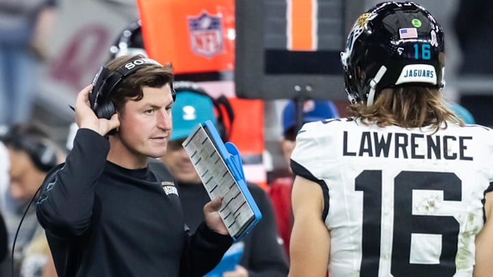 Nov 23, 2025; Glendale, Arizona, USA; Jacksonville Jaguars offensive coordinator Grant Udinski with quarterback Trevor Lawrence (16) against the Arizona Cardinals at State Farm Stadium. Mandatory Credit: Mark J. Rebilas-Imagn Images