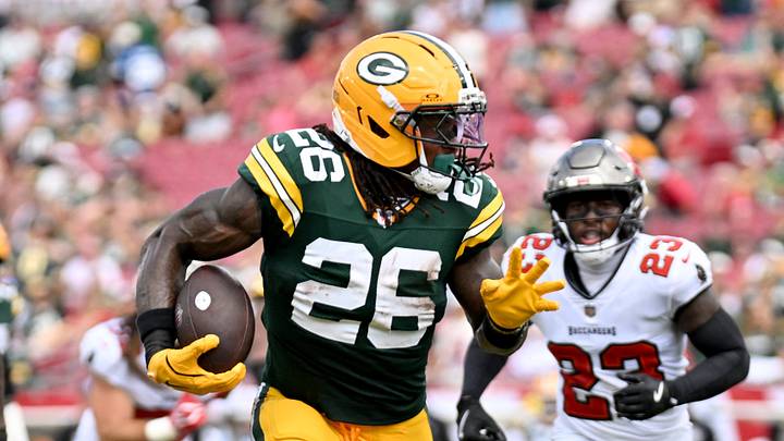 Oct 4, 2026; Tampa, Florida, USA; Green Bay Packers running back Kaleb Johnson (26) runs with the ball past Tampa Bay Buccaneers safety Antoine Winfield Jr. (31) at Raymond James Stadium. Mandatory Credit: Jonathan Dyer-Imagn Images Oct 4, 2026; Tampa, Florida, USA; Green Bay Packers running back Kaleb Johnson (26) runs with the ball past Tampa Bay Buccaneers safety Antoine Winfield Jr. (31) at Raymond James Stadium. Mandatory Credit: Jonathan Dyer-Imagn Images