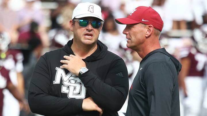 Mississippi State Bulldogs head coach Jeff Lebby and Alabama Crimson Tide head coach Kalen DeBoer talk on the field before the game at Davis Wade Stadium at Scott Field.