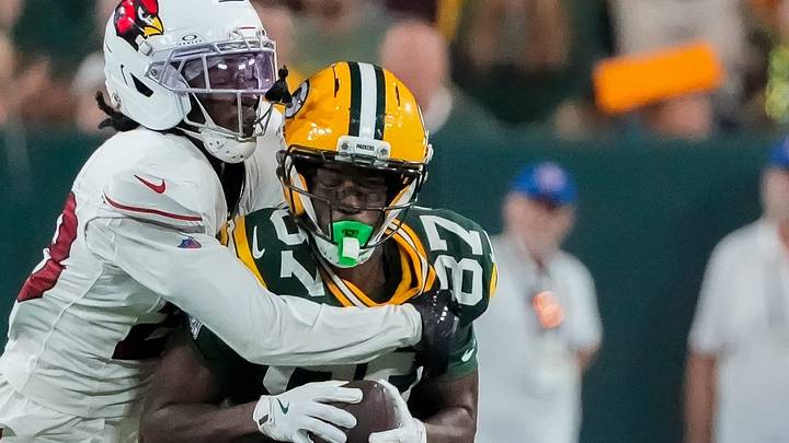 Green Bay Packers receiver J. Michael Sturdivant (87) is hit by Arizona Cardinals cornerback Elijah Jones. Green Bay Packers receiver J. Michael Sturdivant (87) is hit by Arizona Cardinals cornerback Elijah Jones.