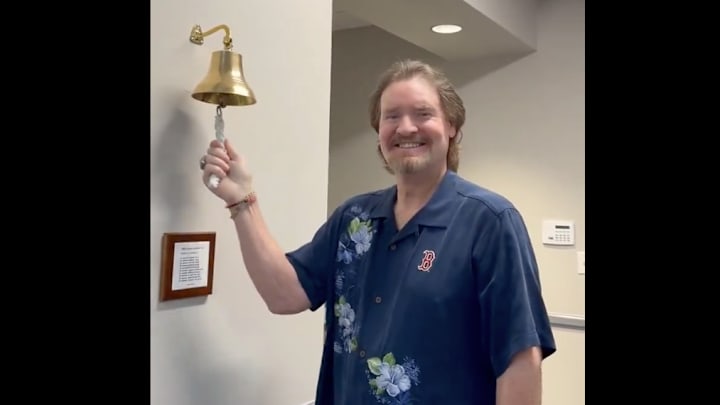 Boggs rings a bell, signaling he is cancer free. Boggs rings a bell, signaling he is cancer free.