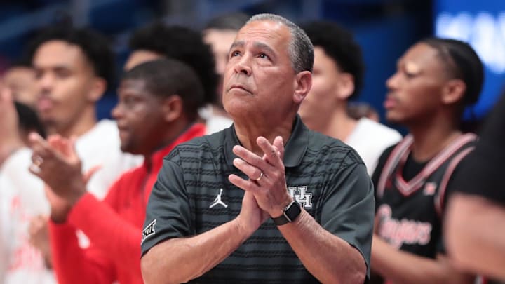 Houston Cougars head coach Kelvin Sampson applauds a play against Kansas Jayhawks during the game inside Allen Fieldhouse on Monday, Feb. 23, 2026.