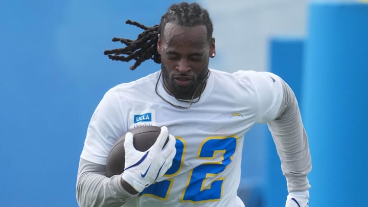 May 12, 2025; El Segundo, CA, USA; Los Angeles Chargers running back Najee Harris (22) carries the ball during offseason workouts at The Bolt. Mandatory Credit: Kirby Lee-Imagn Images