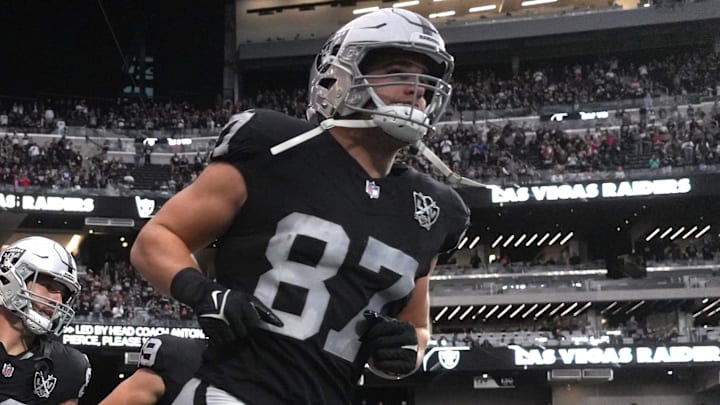 Dec 22, 2024; Paradise, Nevada, USA; Las Vegas Raiders tight end Michael Mayer (87) and tight end John Samuel Shenker (86) enter the field before the game against the Jacksonville Jaguars Allegiant Stadium. Mandatory Credit: Kirby Lee-Imagn Images