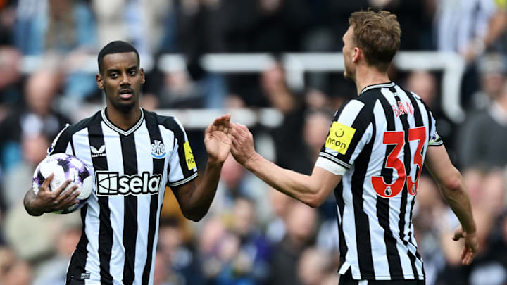 Alexander Isak (left) played 98 games for Newcastle together with Dan Burn.