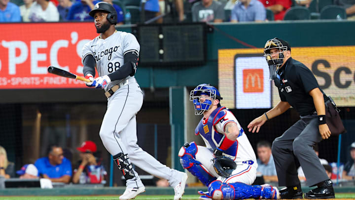 Jul 24, 2024; Arlington, Texas, USA; Chicago White Sox center fielder Luis Robert Jr. (88) hits a home run during the third inning against the Texas Rangers at Globe Life Field.