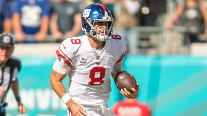 Oct 23, 2022; Jacksonville, Florida, USA; New York Giants quarterback Daniel jones (8) runs the ball against the Jacksonville Jaguars in the third quarter at TIAA Bank Field. Mandatory Credit: Jeremy Reper-Imagn Images