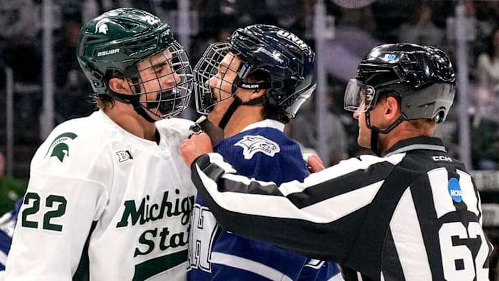 Michigan State's Porter Martone, left, has words with New Hampshire's Josh Player during the first period on Thursday, Oct. 9, 2025, at Munn Ice Arena in East Lansing. Michigan State's Porter Martone, left, has words with New Hampshire's Josh Player during the first period on Thursday, Oct. 9, 2025, at Munn Ice Arena in East Lansing.