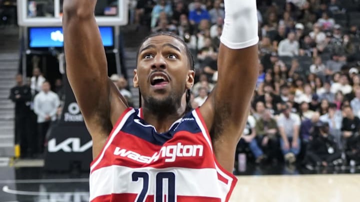 Nov 13, 2024; San Antonio, Texas, USA; Washington Wizards forward Alex Sarr (20) goes up to dunk during the first half against the San Antonio Spurs at Frost Bank Center. Mandatory Credit: Scott Wachter-Imagn Images