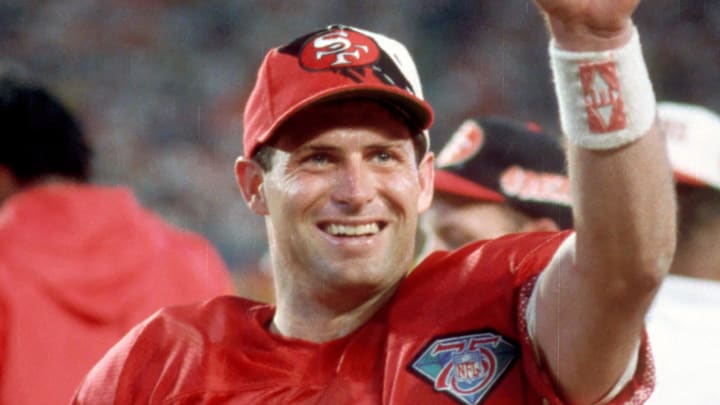 Jan 29, 1995; Miami, FL, USA; FILE PHOTO; San Francisco 49ers quarterback (8) STEVE YOUNG acknowledges the fans as the 49ers defeated the San Diego Chargers in Super Bowl XXIX 49-26 at Joe Robbie Stadium. Young was named the games most valuable player after going 24-36 for 325 yards and six touchdowns. Mandatory Credit: Tony Tomsic-USA TODAY NETWORK