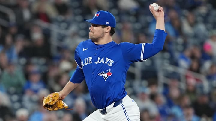May 20, 2025; Toronto, Ontario, CAN; Toronto Blue Jays relief pitcher Brendon Little (54) throws a pitch against the San Diego Padres during the seventh inning at Rogers Centre.