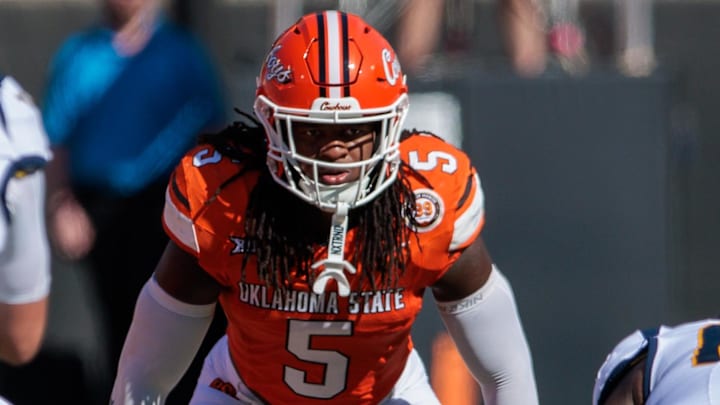Oct 5, 2024; Stillwater, Oklahoma, USA; Oklahoma State Cowboys safety Kendal Daniels (5) ready for a play against the West Virginia Mountaineers during the second quarter at Boone Pickens Stadium. Mandatory Credit: William Purnell-Imagn Images Oct 5, 2024; Stillwater, Oklahoma, USA; Oklahoma State Cowboys safety Kendal Daniels (5) ready for a play against the West Virginia Mountaineers during the second quarter at Boone Pickens Stadium. Mandatory Credit: William Purnell-Imagn Images