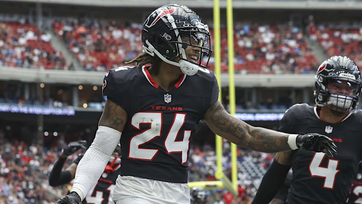 Aug 17, 2024; Houston, Texas, USA; Houston Texans cornerback Derek Stingley Jr. (24) celebrates after an interception during the first quarter against the New York Giants at NRG Stadium. Mandatory Credit: Troy Taormina-Imagn Images