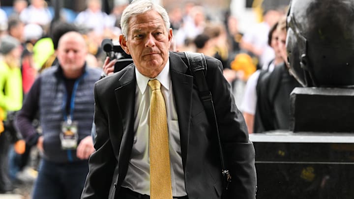 Nov 2, 2024; Iowa City, Iowa, USA; Iowa Hawkeyes head coach Kirk Ferentz enters Kinnick Stadium before the game against the Wisconsin Badgers. Mandatory Credit: Jeffrey Becker-Imagn Images