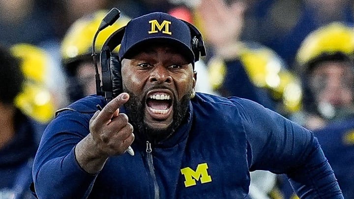 Michigan head coach Sherrone Moore challenges an incomplete pass intended for tight end Colston Loveland (not pictured) during the second half against Oregon at Michigan Stadium in Ann Arbor on Saturday, Nov. 2, 2024. Moore lost the challenge.