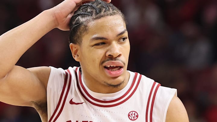Jan 3, 2026; Fayetteville, Arkansas, USA; Arkansas Razorbacks guard Darius Acuff Jr (5) reacts after a play against the Tennessee Volunteers during the second half at Bud Walton Arena.  Mandatory Credit: Nelson Chenault-Imagn Images