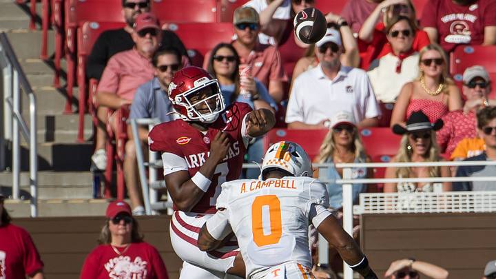 Arkansas Razorbacks quarterback KJ Jackson (7) is pressured by Tennessee Volunteers linebacker Amare Campbell (0) during the second quarter at Donald W. Reynolds Razorback Stadium. Arkansas Razorbacks quarterback KJ Jackson (7) is pressured by Tennessee Volunteers linebacker Amare Campbell (0) during the second quarter at Donald W. Reynolds Razorback Stadium.