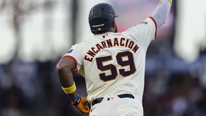 Sep 11, 2024; San Francisco, California, USA; San Francisco Giants designated hitter Jerar Encarnacion (59) gestures as he runs the bases after hitting a two-run home run against the Milwaukee Brewers during the first inning at Oracle Park