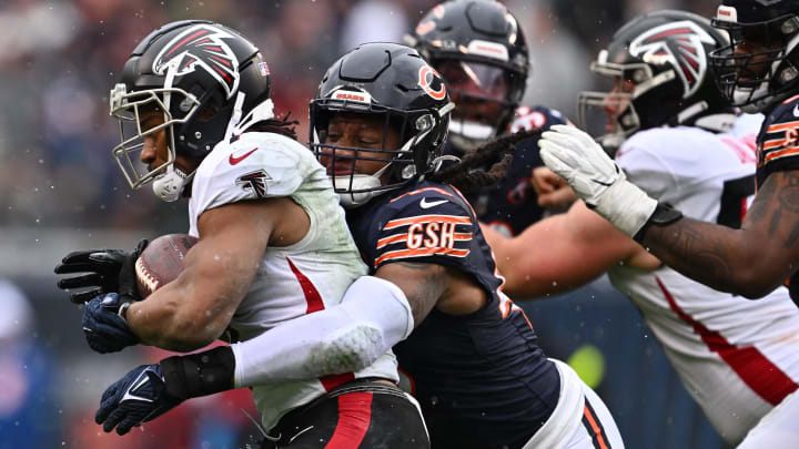 Linebacker Tremaine Edmunds wraps up Bijan Robinson for a tackle last season during a 37-17 Bears victory. Linebacker Tremaine Edmunds wraps up Bijan Robinson for a tackle last season during a 37-17 Bears victory.