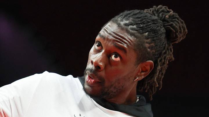Jan 11, 2026; Portland, Oregon, USA; Portland Trail Blazers guard Jrue Holiday (5) reacts while taking a one-handed shot during warm ups before playing against the New York Knicks at Moda Center. Mandatory Credit: Jaime Valdez-Imagn Images Jan 11, 2026; Portland, Oregon, USA; Portland Trail Blazers guard Jrue Holiday (5) reacts while taking a one-handed shot during warm ups before playing against the New York Knicks at Moda Center. Mandatory Credit: Jaime Valdez-Imagn Images