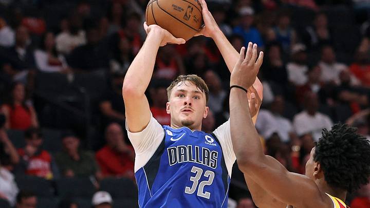 Oct 21, 2026; Houston, Texas, USA; Dallas Mavericks forward Cooper Flagg (32) shoots the ball over Houston Rockets guard/forward Amen Thompson (1) during the fourth quarter at Toyota Center. Mandatory Credit: Troy Taormina-Imagn Images Oct 21, 2026; Houston, Texas, USA; Dallas Mavericks forward Cooper Flagg (32) shoots the ball over Houston Rockets guard/forward Amen Thompson (1) during the fourth quarter at Toyota Center. Mandatory Credit: Troy Taormina-Imagn Images