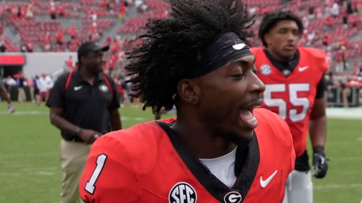 Georgia wide receiver Zachariah Branch (1) and Georgia running back Josh McCray (2) after getting a win in a NCAA college football game against Kentucky in Athens, Ga., on Saturday, October 4, 2025. Georgia won 35-14. Georgia wide receiver Zachariah Branch (1) and Georgia running back Josh McCray (2) after getting a win in a NCAA college football game against Kentucky in Athens, Ga., on Saturday, October 4, 2025. Georgia won 35-14.