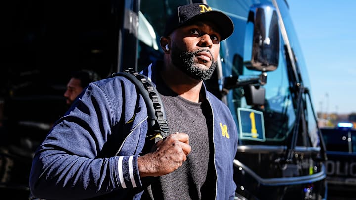 Michigan head coach Sherrone Moore walks off the bus as team arrive for the Oregon game at Michigan Stadium in Ann Arbor on Saturday, Nov. 2, 2024.