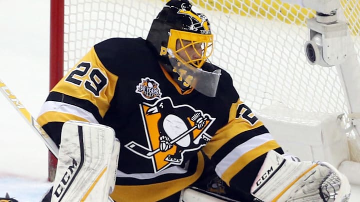 Dec 31, 2016; Pittsburgh, PA, USA;  Pittsburgh Penguins goalie Marc-Andre Fleury (29) makes a save against the Montreal Canadiens during the second period at the PPG PAINTS Arena. The Penguins won 4-3 in overtime. Mandatory Credit: Charles LeClaire-Imagn Images