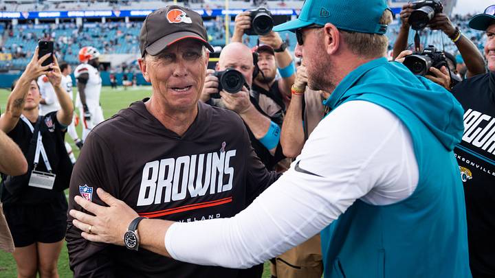 Cleveland Browns head coach Todd Monken, left and Jacksonville Jaguars head coach Liam Coen, right, meet at midfield at EverBank Stadium, Sunday, September 13, 2026, in Jacksonville, Fla. The Jaguars defeated the Browns 34-10. [Doug Engle/Florida Times-Union]