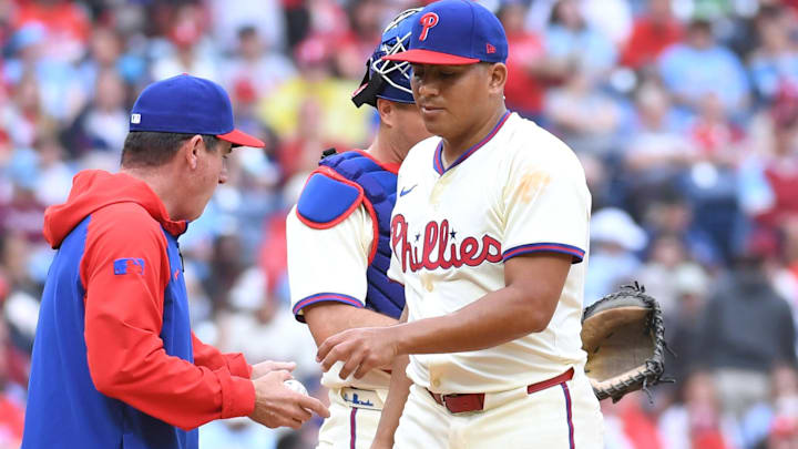 May 4, 2025; Philadelphia, Pennsylvania, USA; Philadelphia Phillies manager Rob Thomson (59) takes the ball from pitcher Ranger Suarez (55) during the fourth inning against the Arizona Diamondbacks at Citizens Bank Park