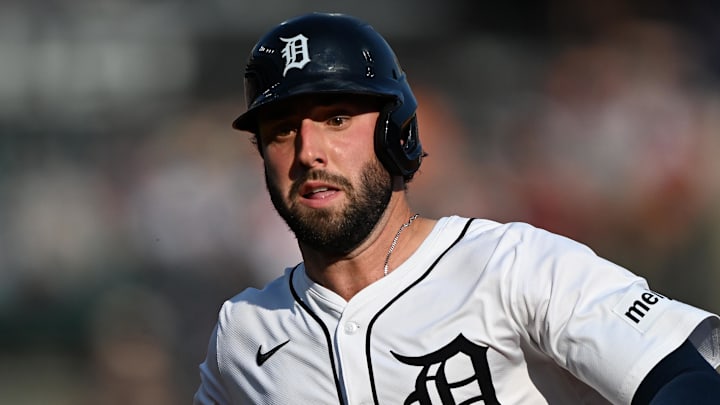 Aug 9, 2025; Detroit, Michigan, USA;  Detroit Tigers right fielder Matt Vierling (8) hustles back to first base to avoid being doubled off on a fly ball to deep right field against the Los Angeles Angels in the second inning at Comerica Park.