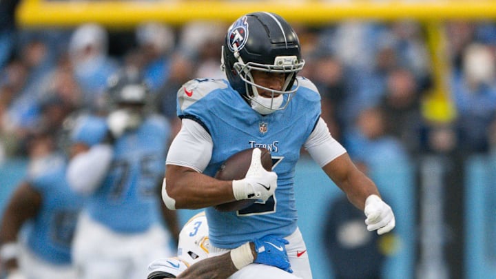 Nov 2, 2025; Nashville, Tennessee, USA;  Tennessee Titans wide receiver Elic Ayomanor (5) runs with the ball after a made catch against the Los Angeles Chargers during the second half at Nissan Stadium. Mandatory Credit: Steve Roberts-Imagn Images