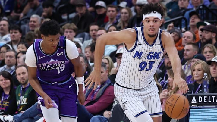 Dec 20, 2025; Salt Lake City, Utah, USA; Orlando Magic forward Noah Penda (93) advances the ball after a steal against Utah Jazz guard Ace Bailey (19) during the second quarter at Delta Center. Mandatory Credit: Rob Gray-Imagn Images