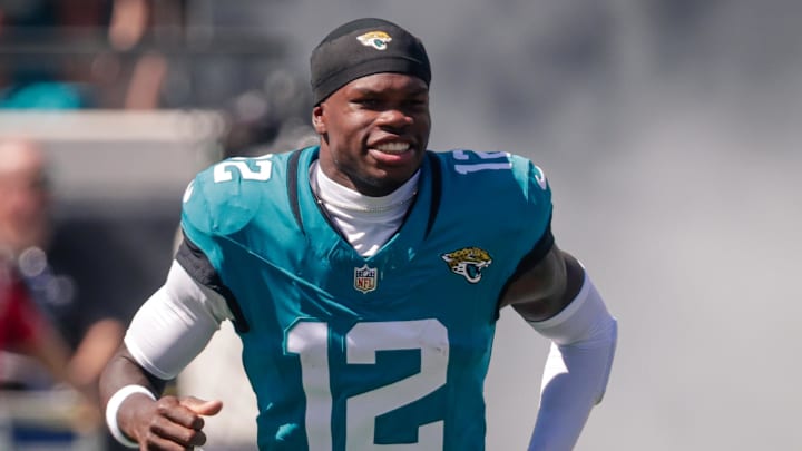 Oct 12, 2025; Jacksonville, Florida, USA;Jacksonville Jaguars player Travis Hunter (12) runs out during team introductions before the game against the Seattle Seahawks at EverBank Stadium. Mandatory Credit: Travis Register-Imagn Images