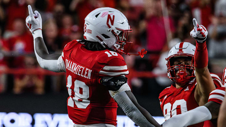 Princewill Umanmielen (18) celebrates a first quarter fumble recovery. 