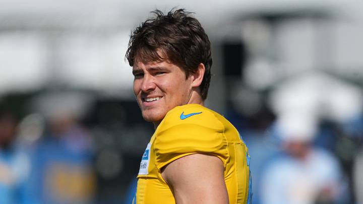 Aug 7, 2025; El Segundo, CA, USA; Los Angeles Chargers quarterback Justin Herbert (10) reacts during training camp at The Bolt. Mandatory Credit: Kirby Lee-Imagn Images
