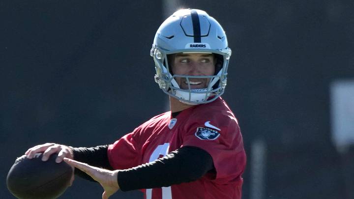 Jun 9, 2026; Henderson, NV, USA; Las Vegas Raiders quarterbacks Fernando Mendoza (15) and Kirk Cousins (8) throw the ball as assistant head coach Mike McCoy (left) watches during minicamp at Intermountain Health Performance Center. Mandatory Credit: Kirby Lee-Imagn Images