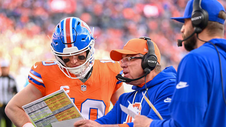 DENVER, CO - JANUARY 04: Denver Head Coach, Sean Payton and Bo Nix 10 of the Denver Broncos, discuss a play during a game between the Los Angeles Chargers and the Denver Broncos at Empower Field at Mile High in Denver, CO on January 04, 2026. DENVER, CO - JANUARY 04: Denver Head Coach, Sean Payton and Bo Nix 10 of the Denver Broncos, discuss a play during a game between the Los Angeles Chargers and the Denver Broncos at Empower Field at Mile High in Denver, CO on January 04, 2026.