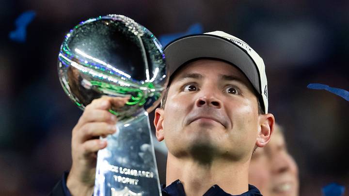 Seattle Seahawks head coach Mike Macdonald celebrates with the Vince Lombardi trophy
