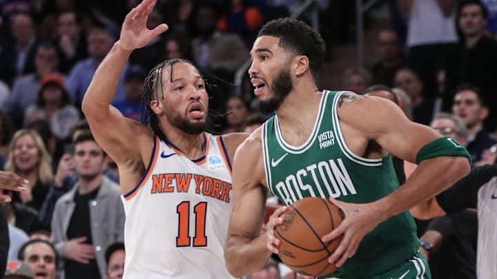 Oct 25, 2023; New York, New York, USA; Boston Celtics forward Jayson Tatum (0) is guarded by New York Knicks guard Jalen Brunson (11) while trying to make a pass in the fourth quarter at Madison Square Garden. Mandatory Credit: Wendell Cruz-Imagn Images