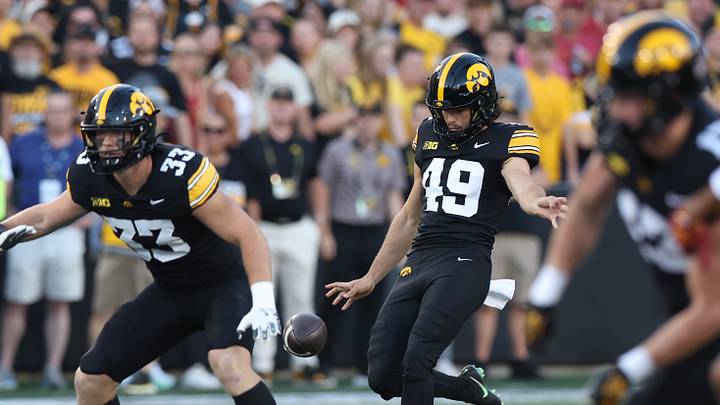Sep 12, 2026; Iowa City, Iowa, USA; Iowa Hawkeyes punter Boston Everitt (49) punts the ball against the Iowa State Cyclones during the first quarter at Kinnick Stadium. Mandatory Credit: Reese Strickland-Imagn Images Sep 12, 2026; Iowa City, Iowa, USA; Iowa Hawkeyes punter Boston Everitt (49) punts the ball against the Iowa State Cyclones during the first quarter at Kinnick Stadium. Mandatory Credit: Reese Strickland-Imagn Images
